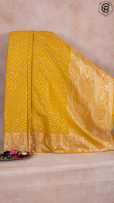 Yellow Zari Curved Line Pattern Warm Silk Saree